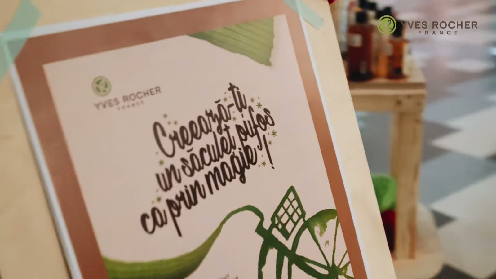 The in-store poster for the activation, inviting shoppers to knit themselves a fluffy pouch as if by magic.